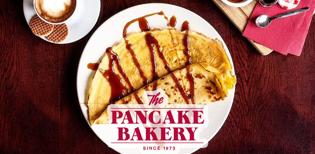 Photo of a dish from The Pancake Bakery with their logo overlaid on top